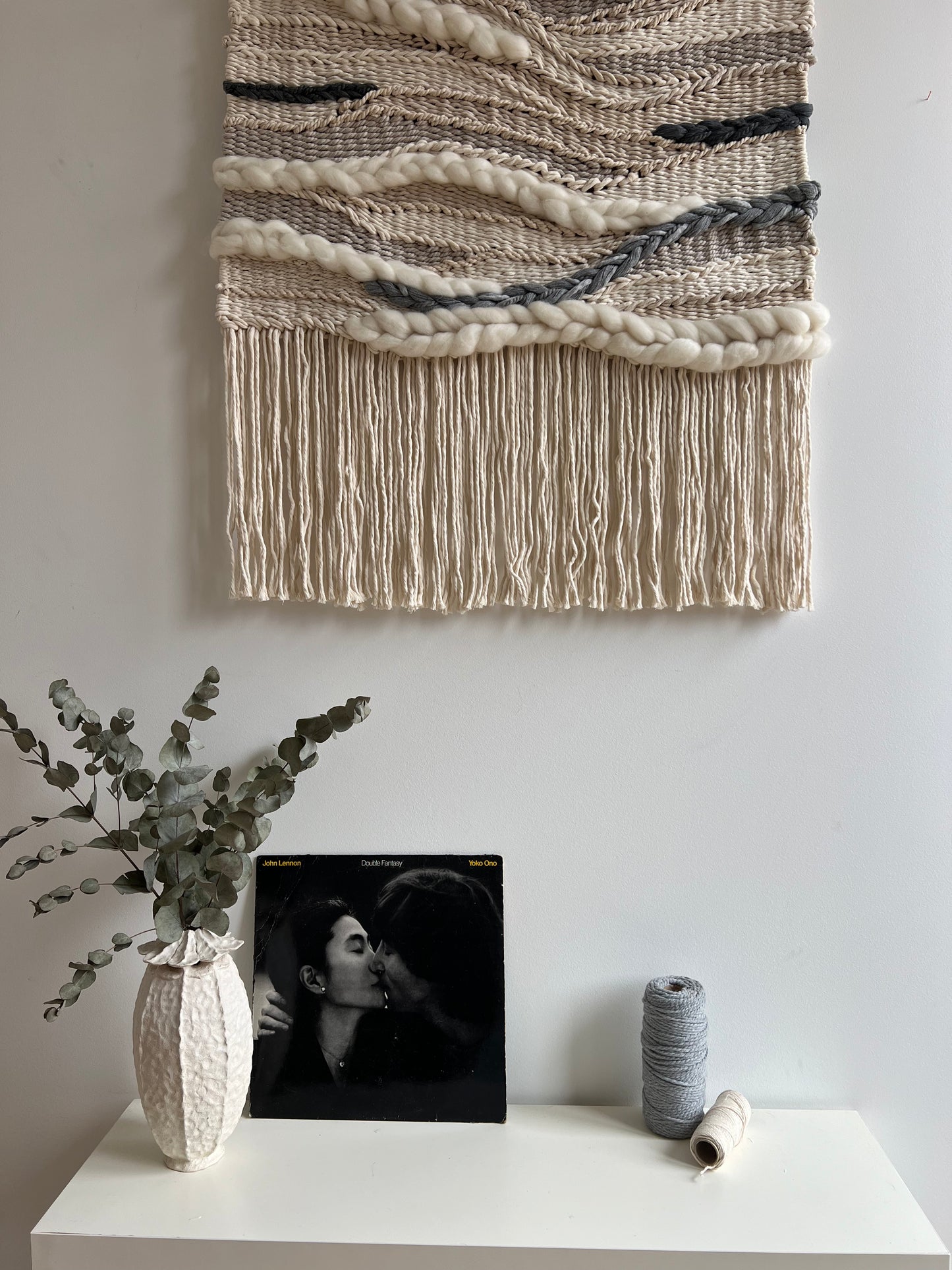 Lower part of the “Stone River” wall hanging with cream fringe